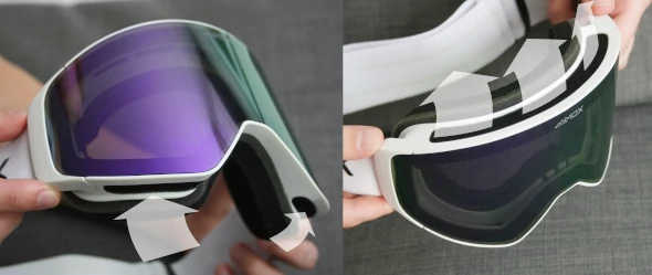 Ventilation openings at the top and bottom of a ski goggle's frame.