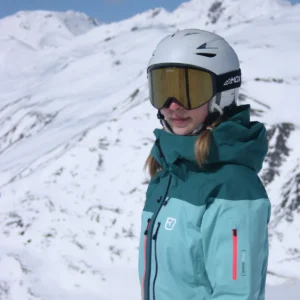 A female wearing an Infinity 2 Black - Cosmic Bronze goggles - Front side view