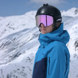 A male wearing an Infinity 2 Black - Fancy Violet goggles - Front side view